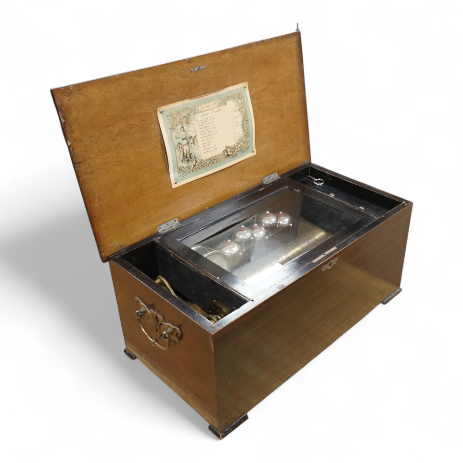 A late 19th century Swiss music box in a rosewood and ebonised case, playing twelve airs on a 52 tooth comb, five bells and a drum, 60cm wide, 27cm high, 32.5cm deep.